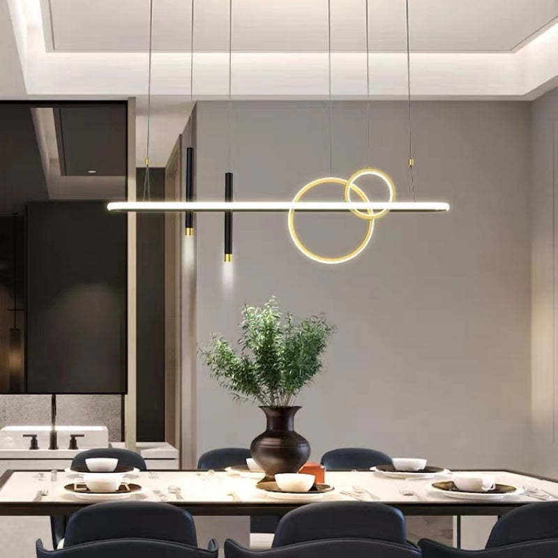Gold-ring Madina pendant over a wooden dining table