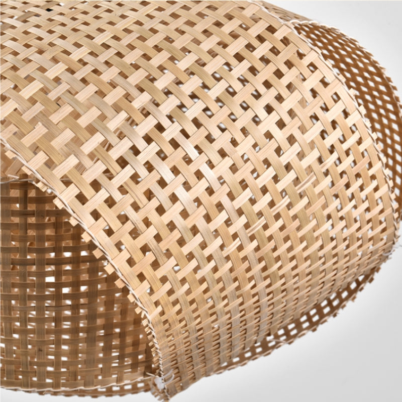 Close-up of the curved woven panels forming the Ritta twisted pendant shade.