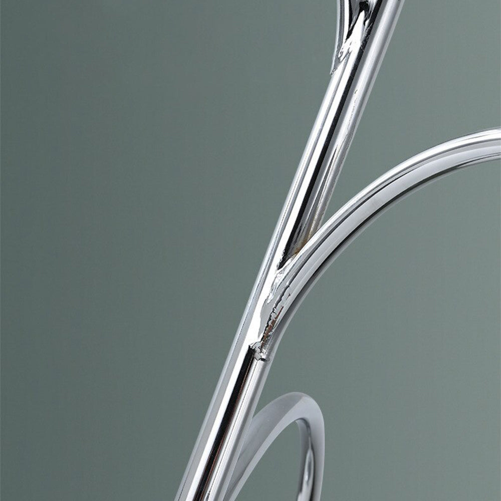 Close view of the polished chrome central stem on the Valentina pendant