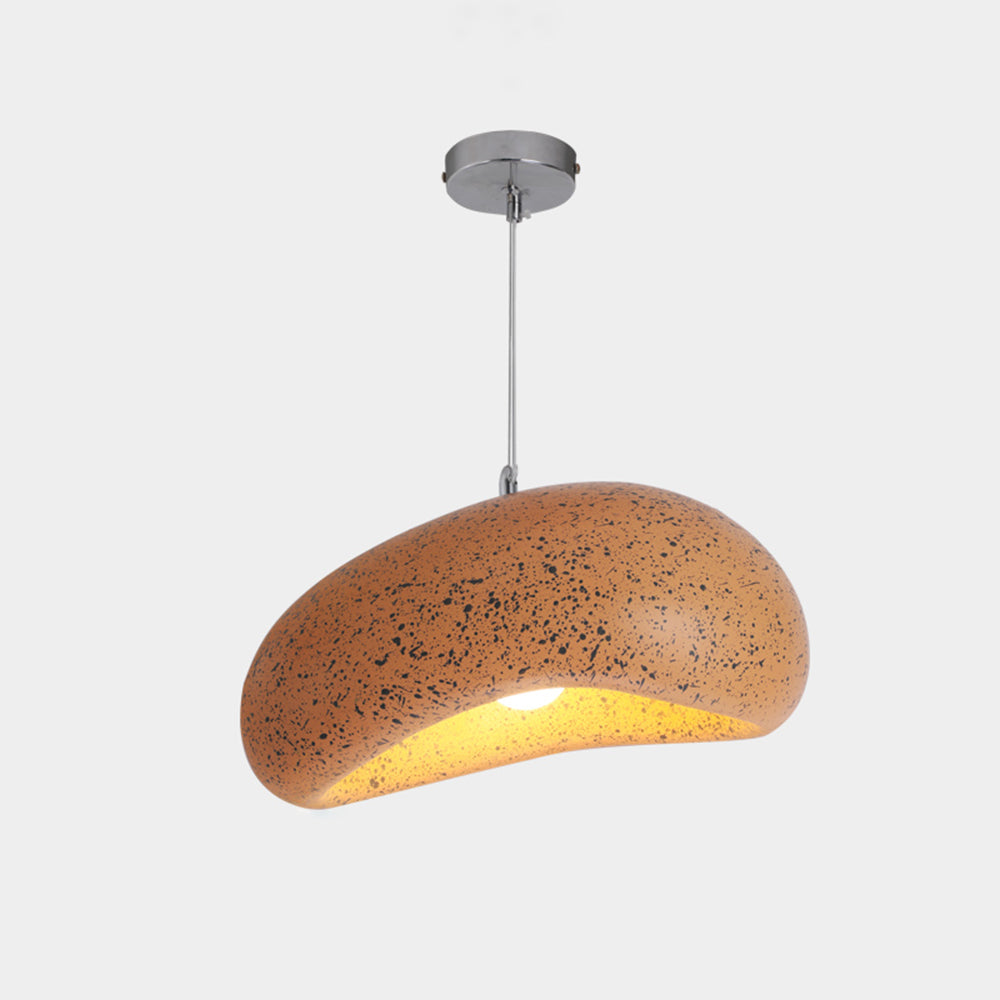 Wood finish view of the Byers bread-shaped pendant light, with orange-brown colour and dark speckles across its curved shade.