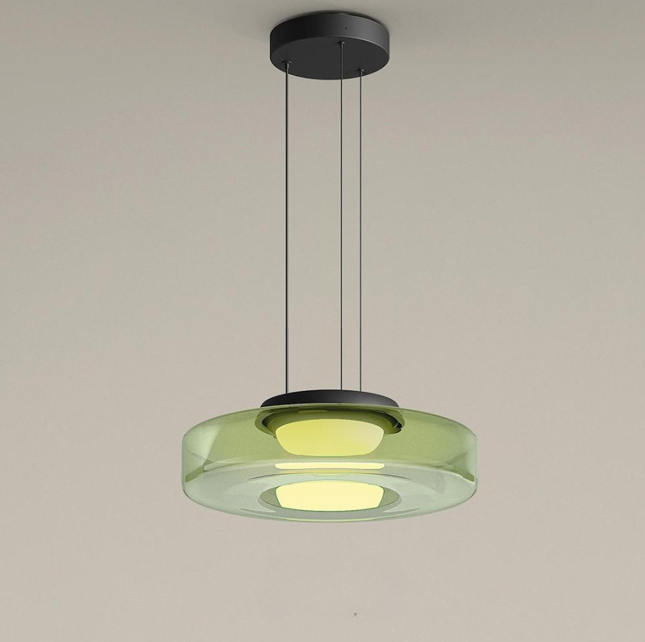 Green single-layer glass pendant with dark ceiling canopy