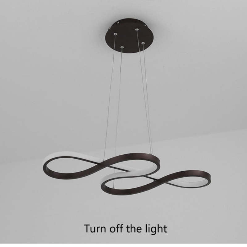 Black looped pendant unlit with ceiling canopy visible