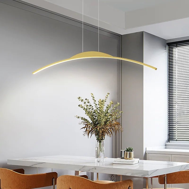 Louise Gold remote-dimmable option pictured above a dining table