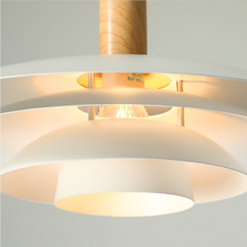 Close view beneath A white stacked discs and centre light