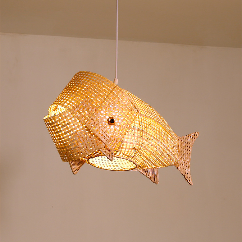 Side view of Muto fish light with an open mouth and woven tail