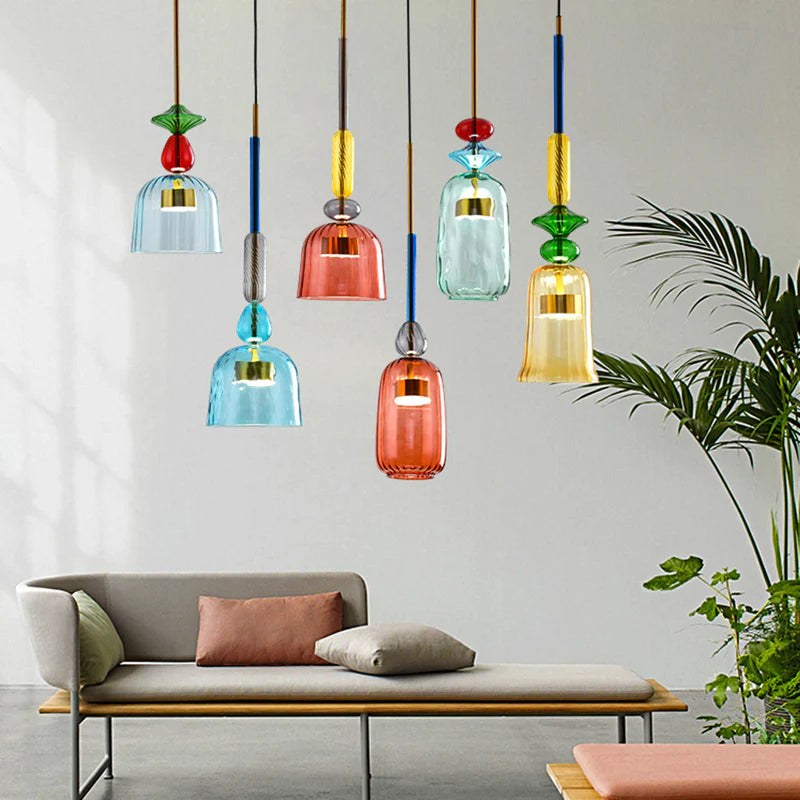 Six coloured glass pendants over sofa seating area