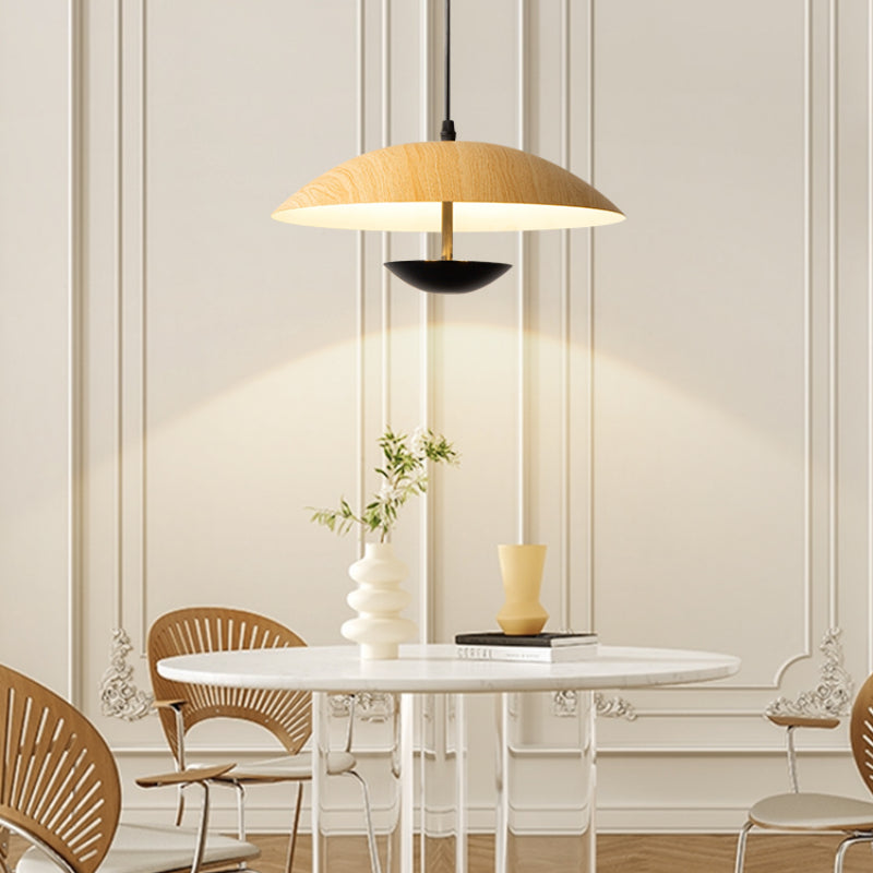 C wood-grain-look dome with black lower bowl above table