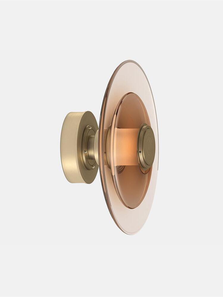 Gold side profile with wall plate and curved amber disc