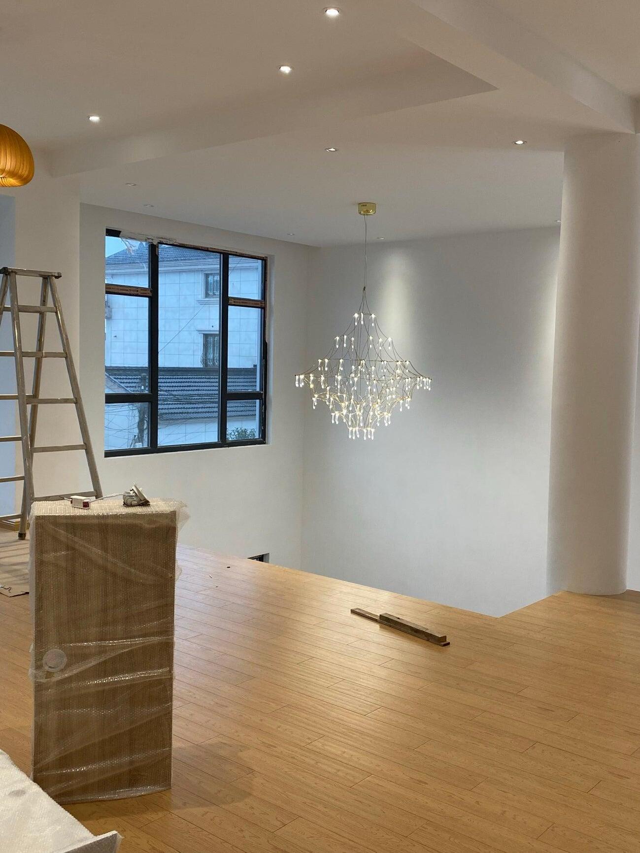 Crystal lattice fixture in an unfinished room