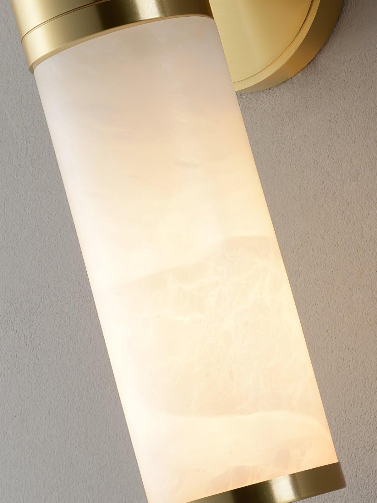 Close white veined stone section and brass end cap