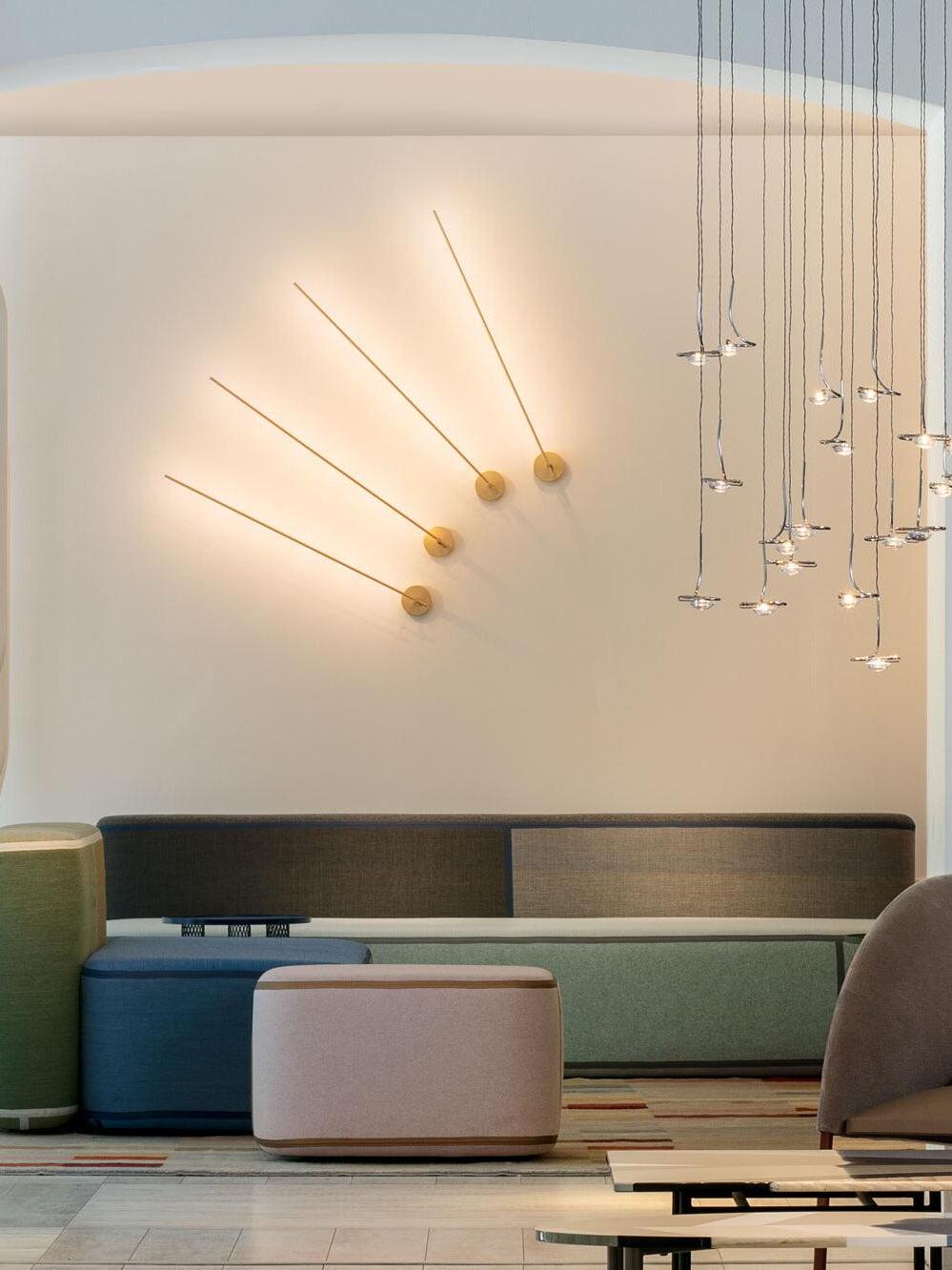 Several angled light rods in a wall arrangement