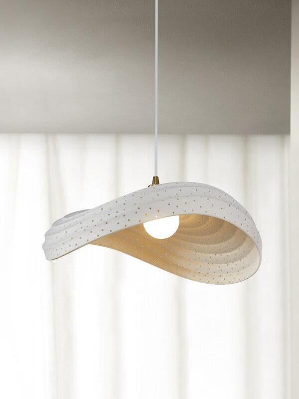 Smaller White cutout pendant showing perforated edge