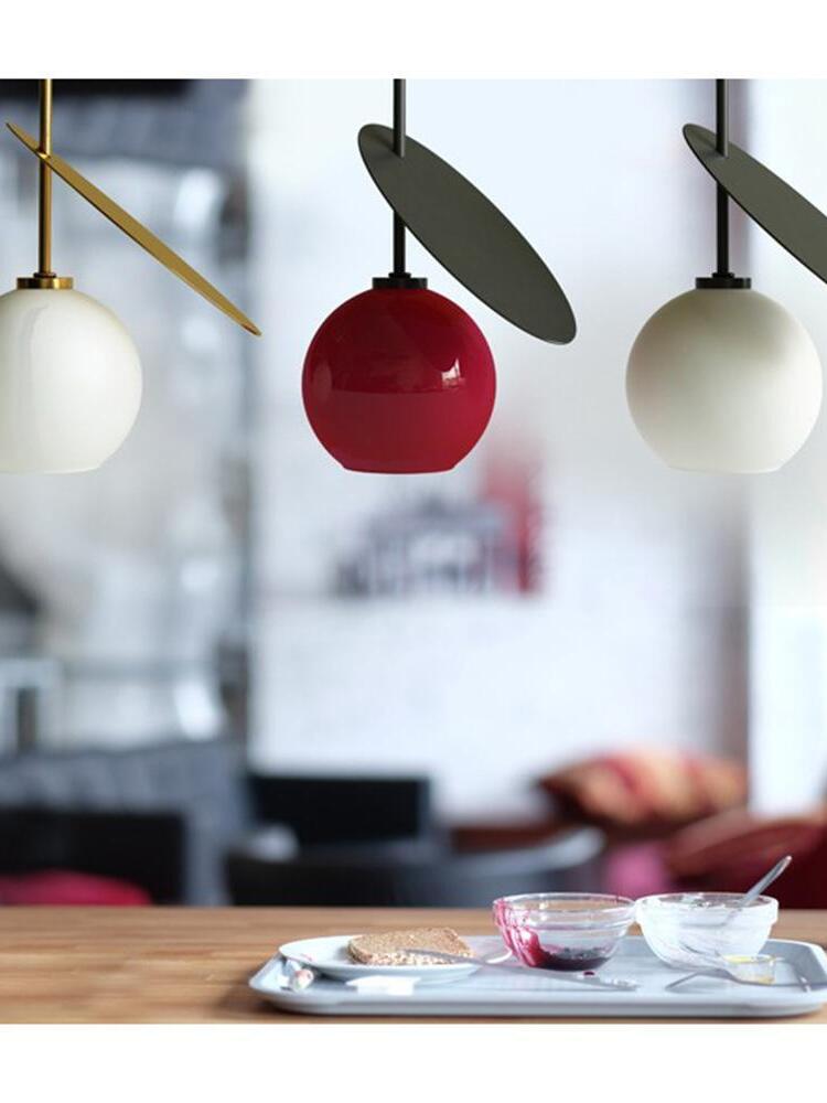 Red and White rounded shades with oval leaf-like discs