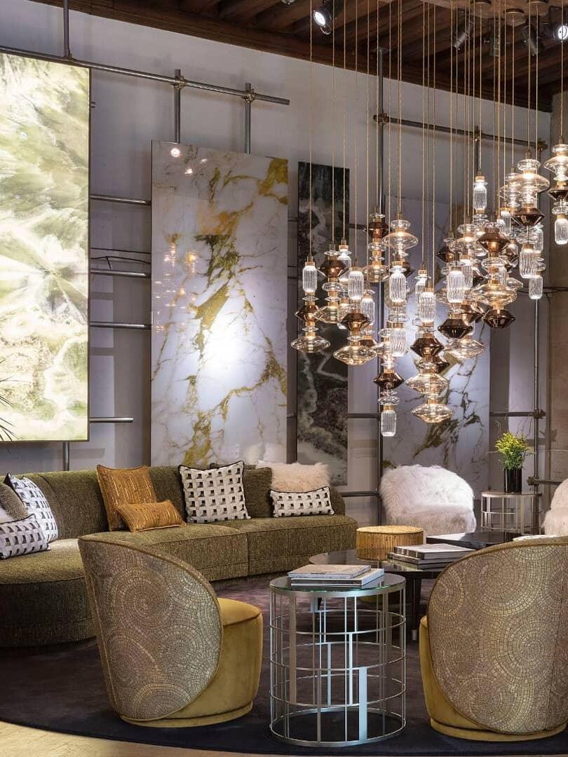 Mixed pendant cluster suspended above lounge seating
