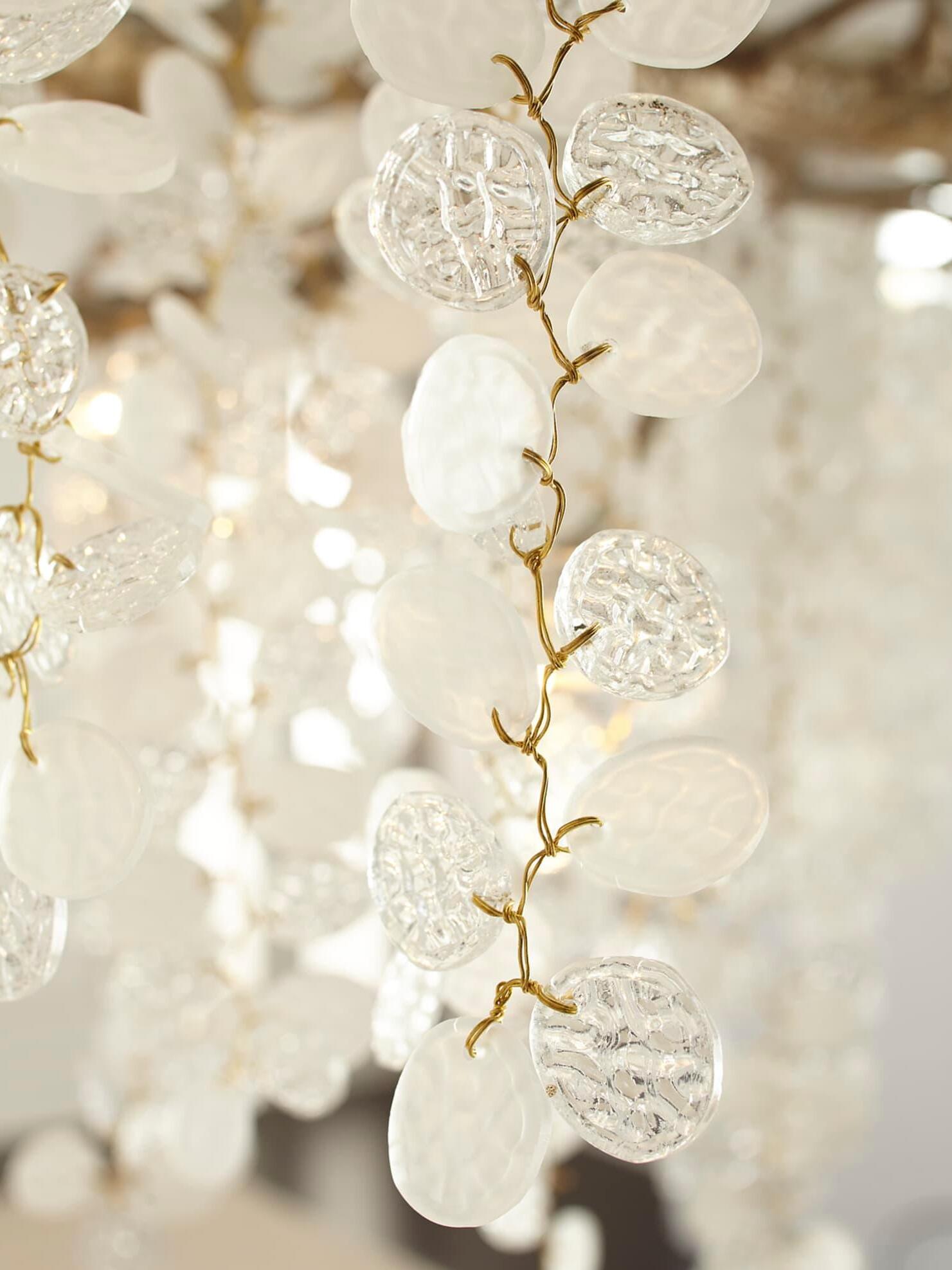 Close view of overlapping clear hanging discs