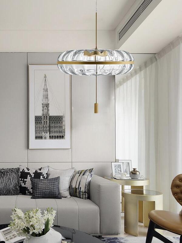 Glass dome pendant in a bright living room