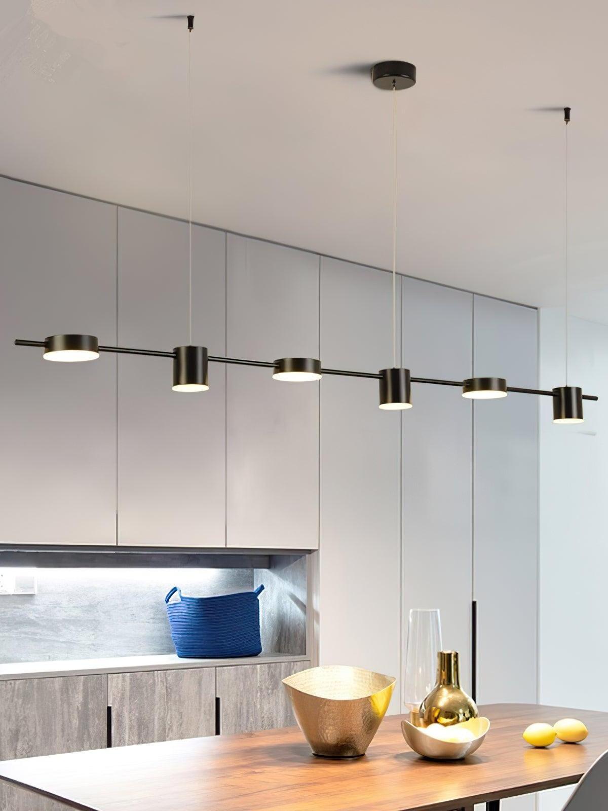 Long linear LED fixture above a kitchen island