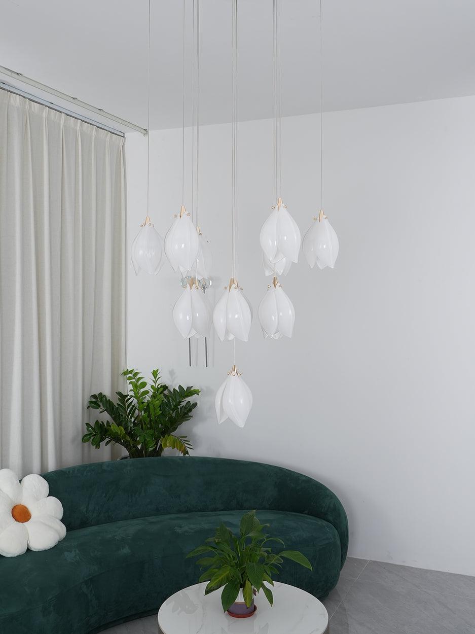 Floral cluster in front of pale curtains