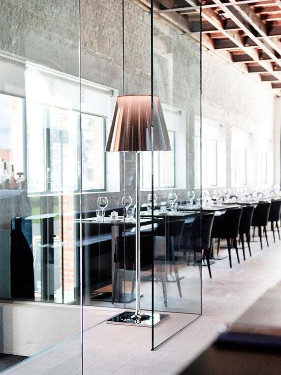 Ktribe reflective bronze-looking shade in a large interior