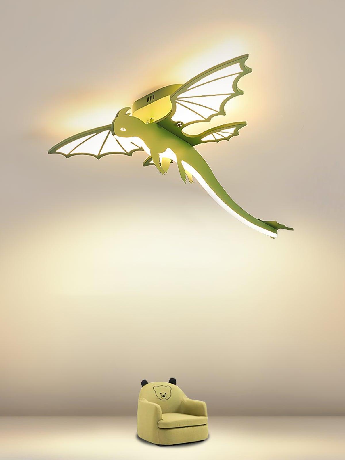 Green creature ceiling light lit above an armchair