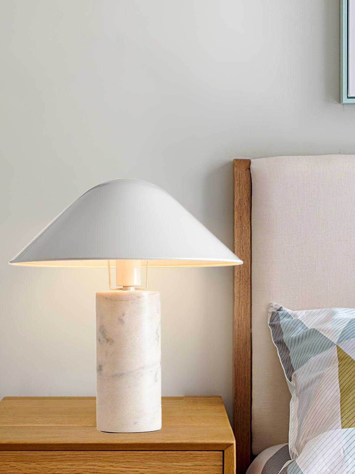 White Adelaide marble table lamp beside bed
