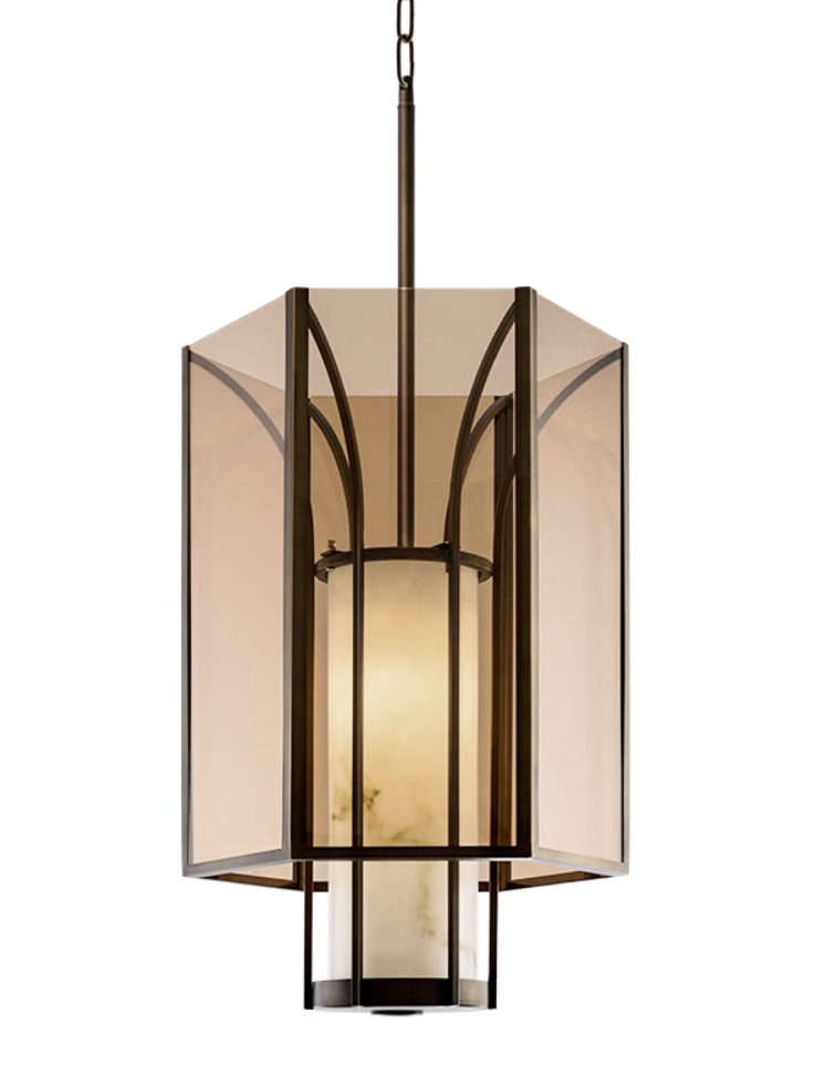 Front close view of amber glass lantern and veined inner cylinder