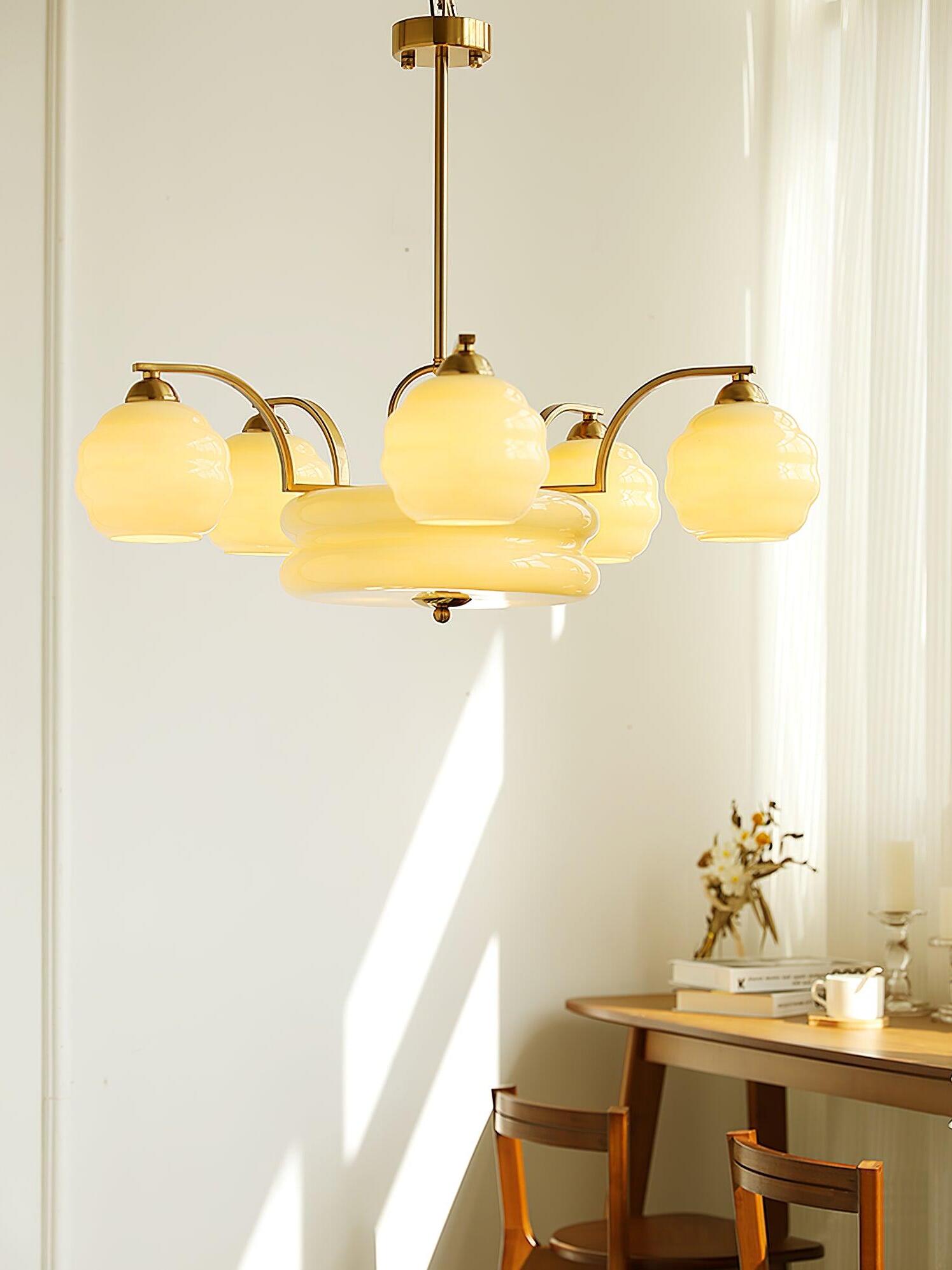 Illuminated glass shades above an indoor table