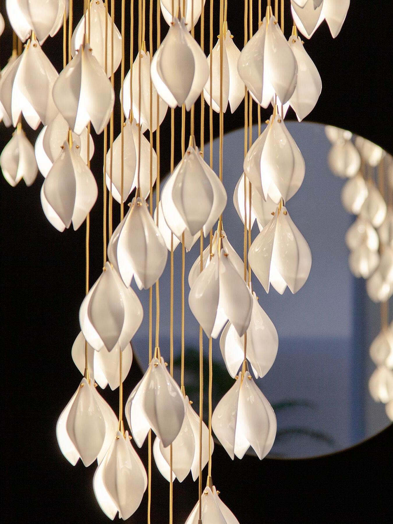Close grouping of White petal pendants