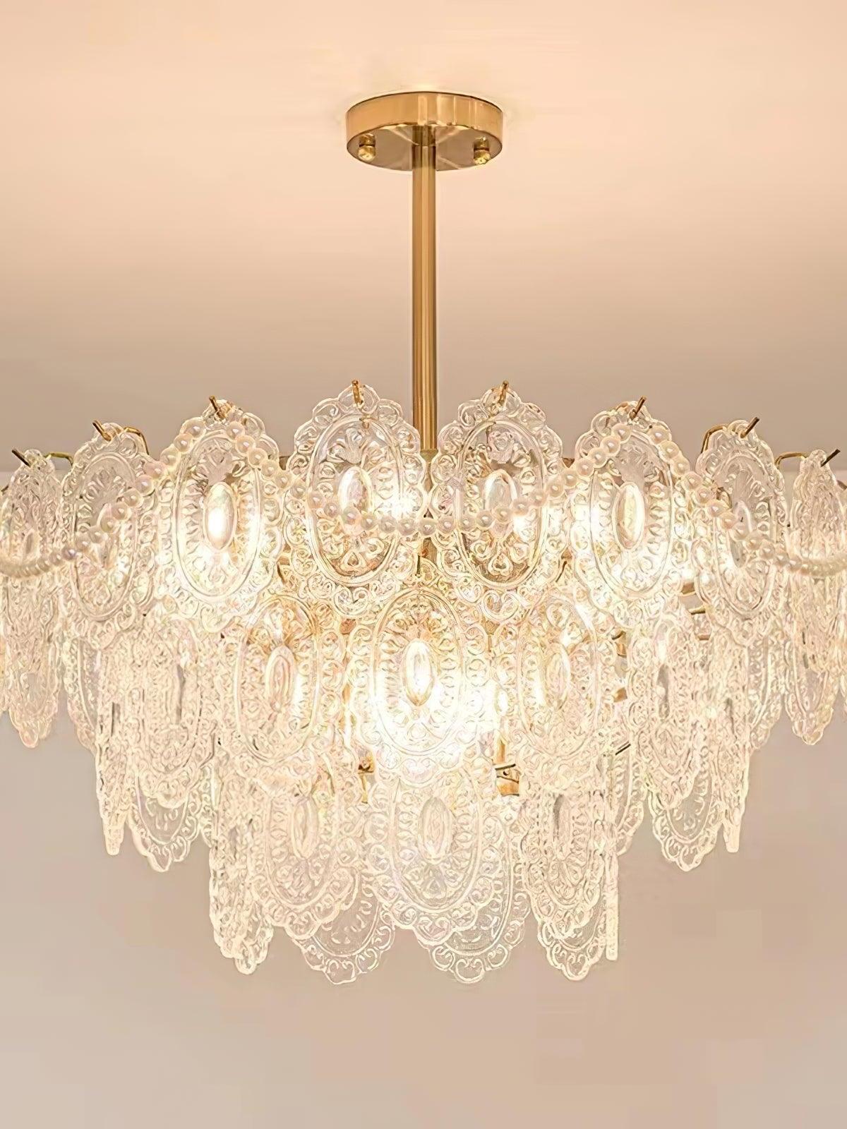 Full tiered Wave Pearl chandelier on plain background
