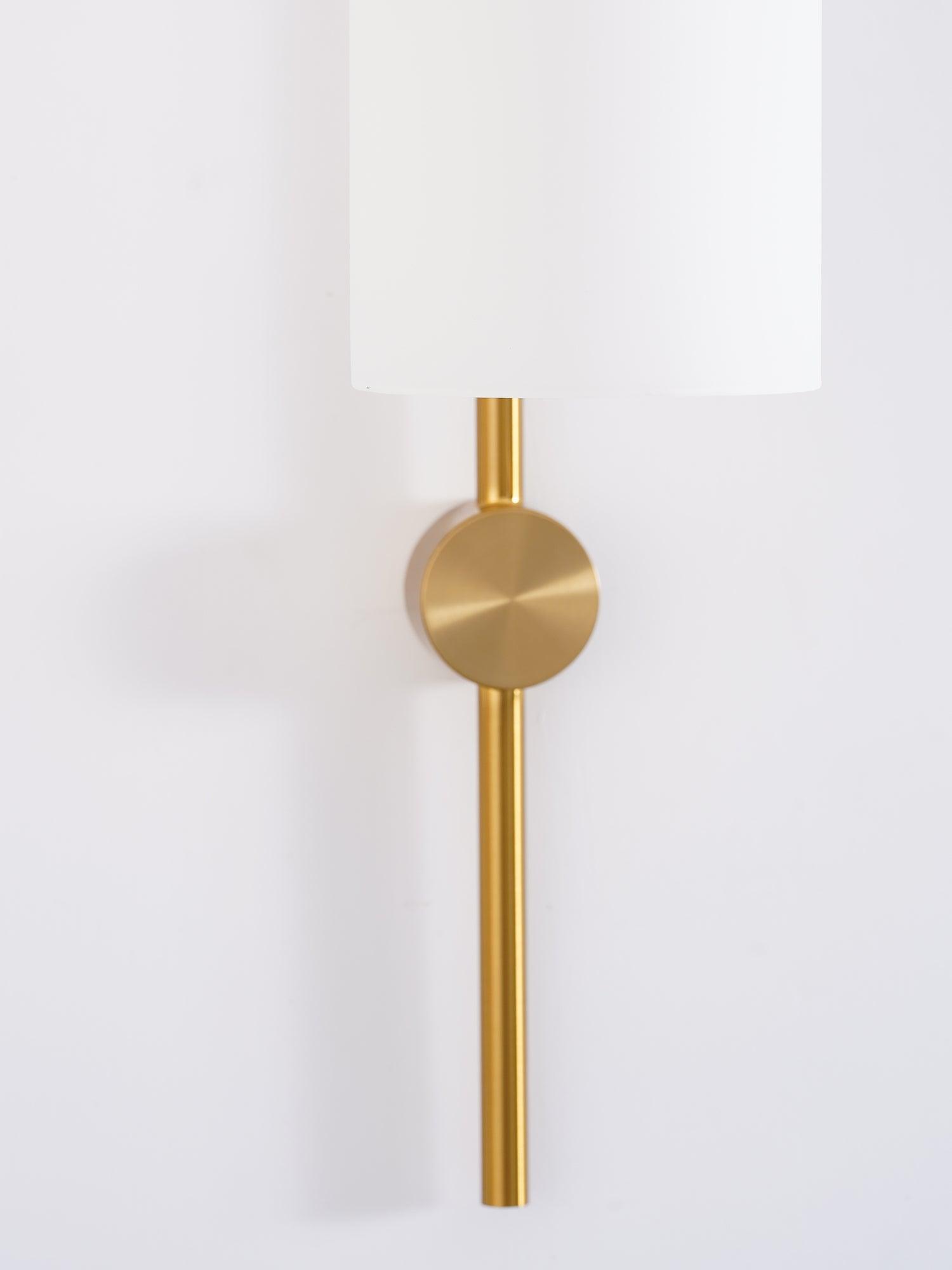 Lower circular wall fitting beneath a white shade