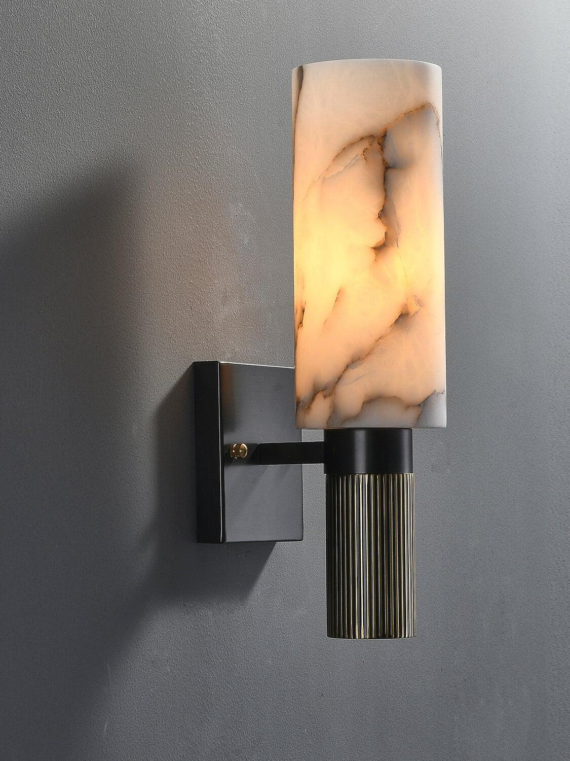Side view of unlit marble cylinder and ribbed stem