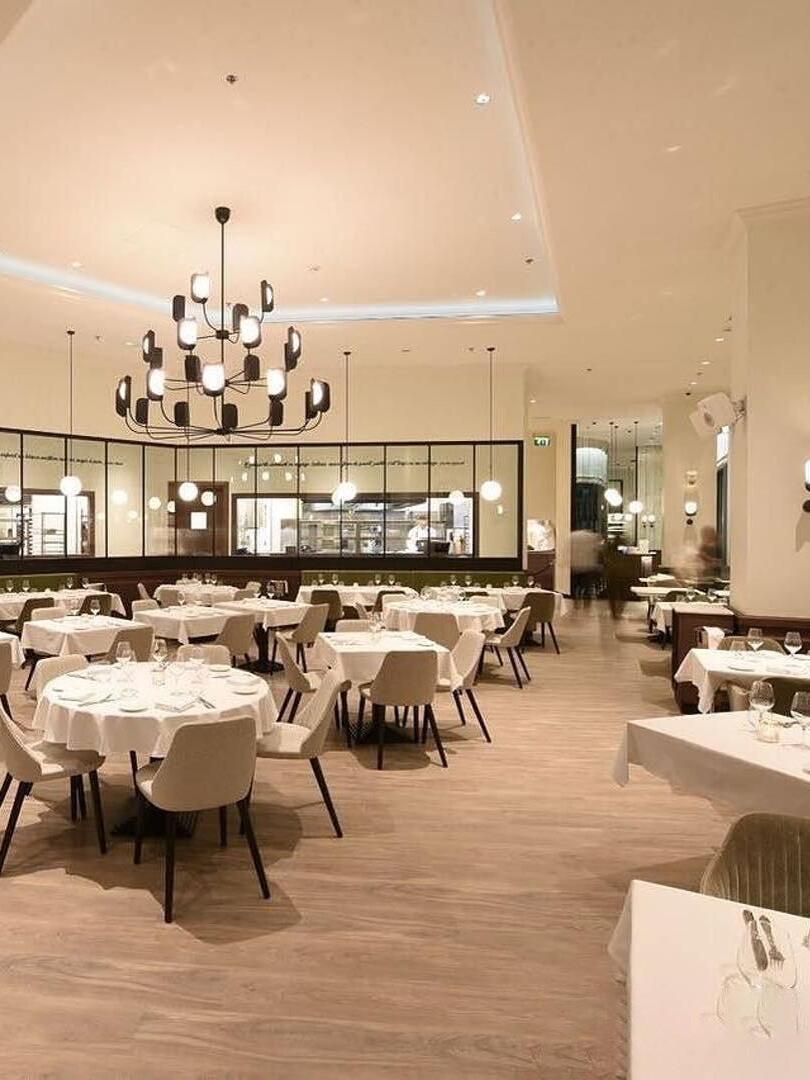 Leaf-shield chandeliers in a dining venue