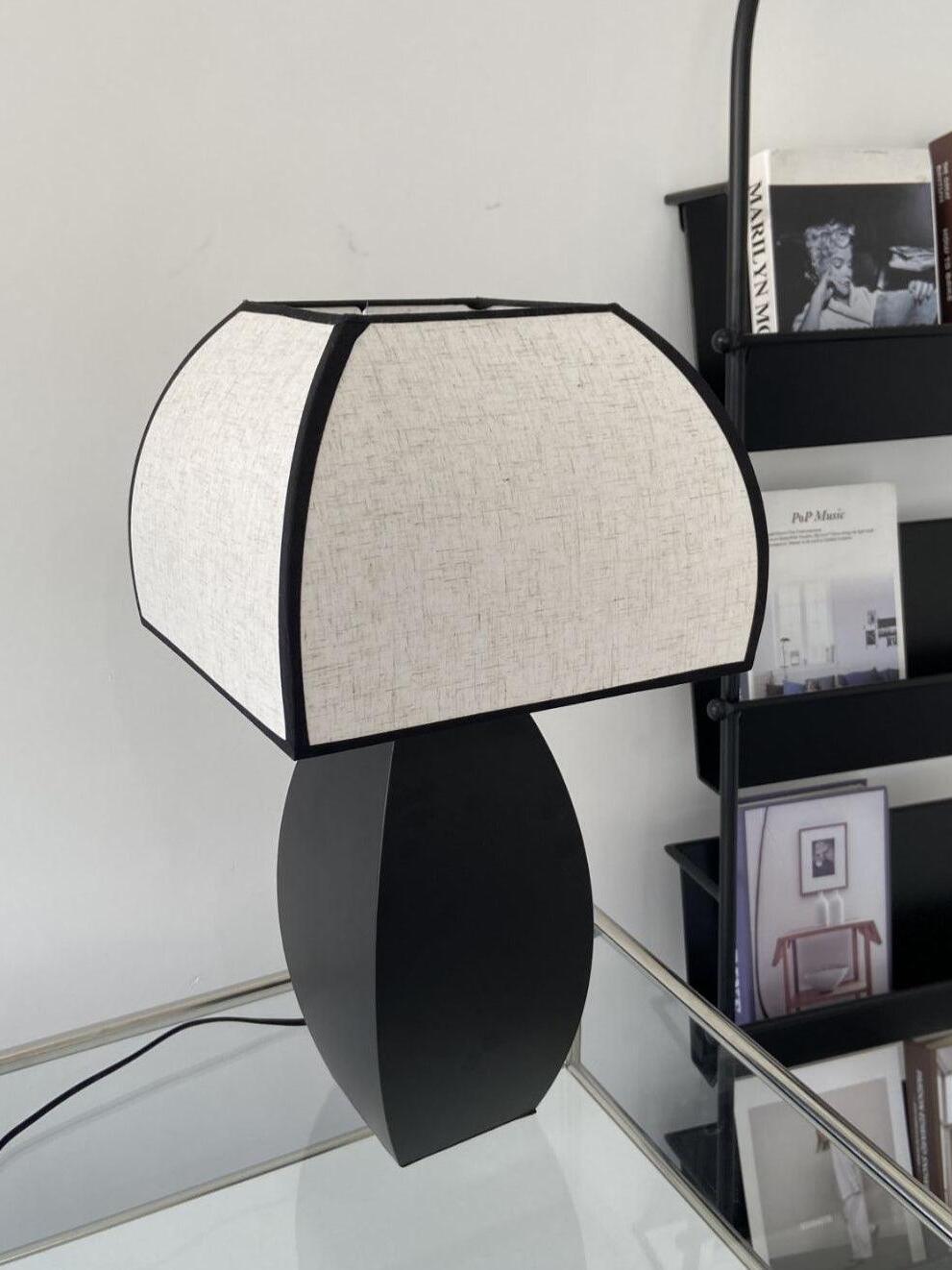Side view of black-edged Javier fabric shade