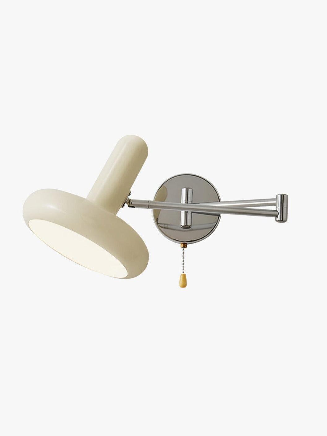 Angled cream disc shade and round chrome wall plate