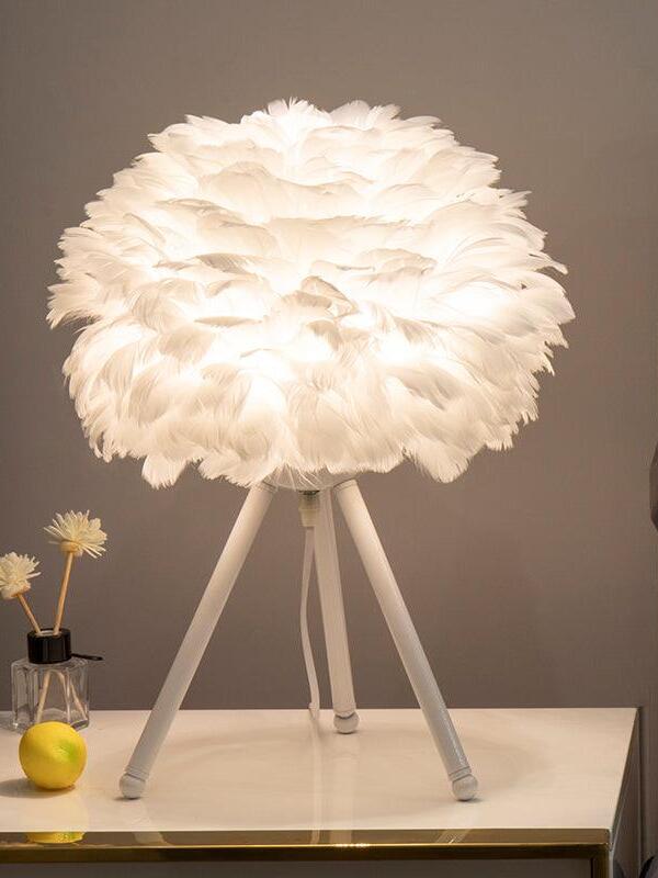 White feather lamp with white tripod