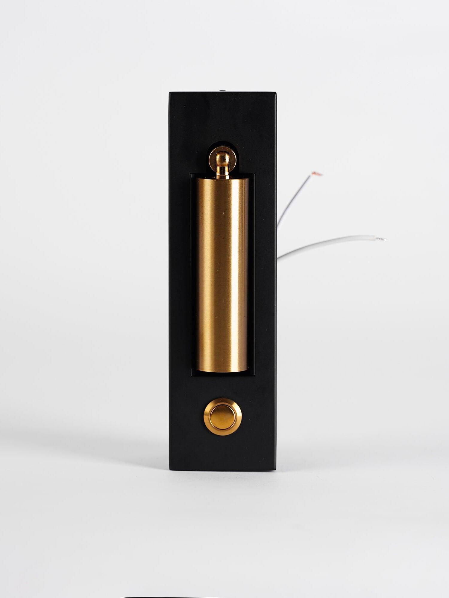 Cylindrical reading head folded into a black housing