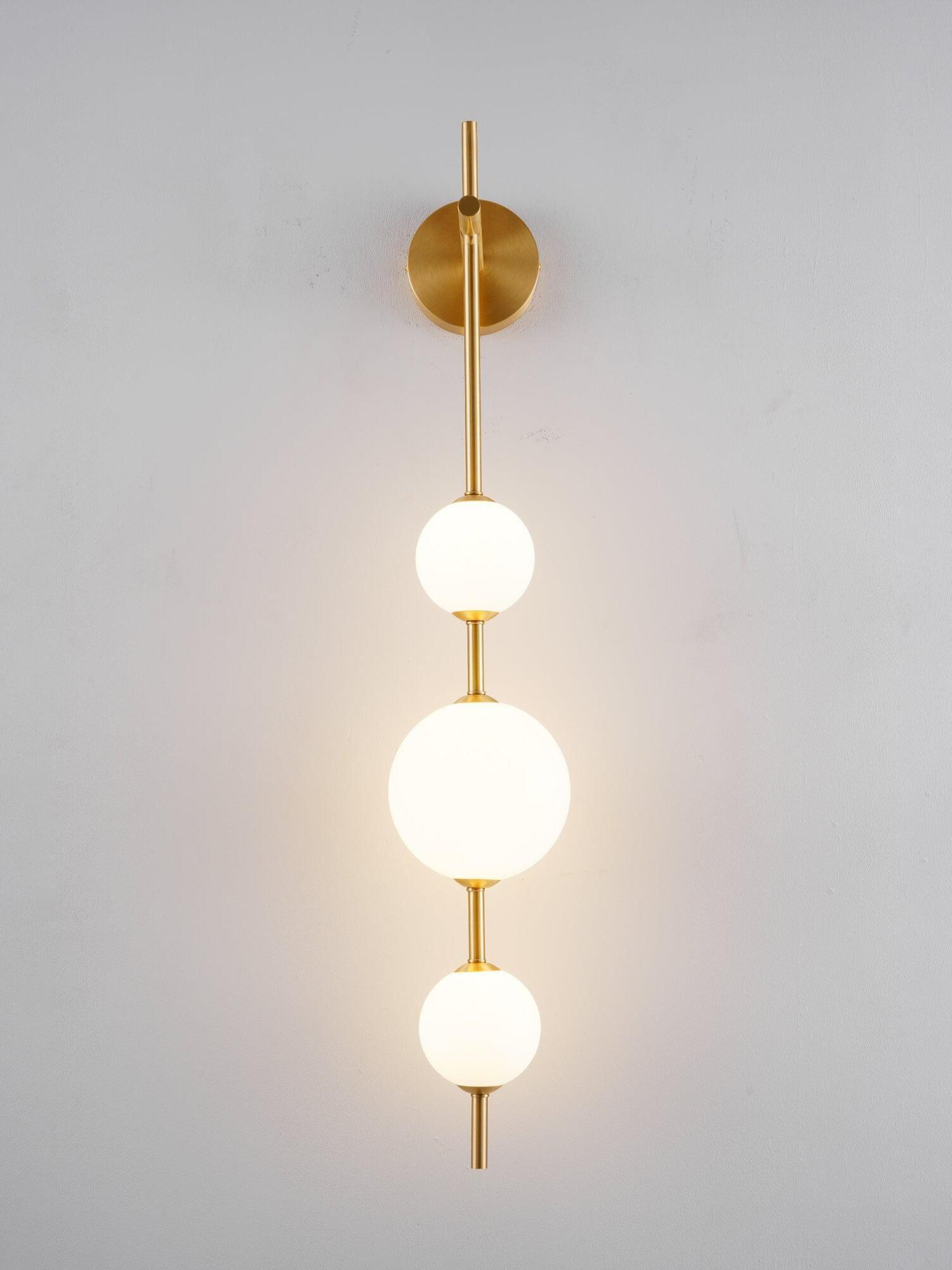 Delicate Glass Globe Vertical Brass Wall Lamp - Cueteks