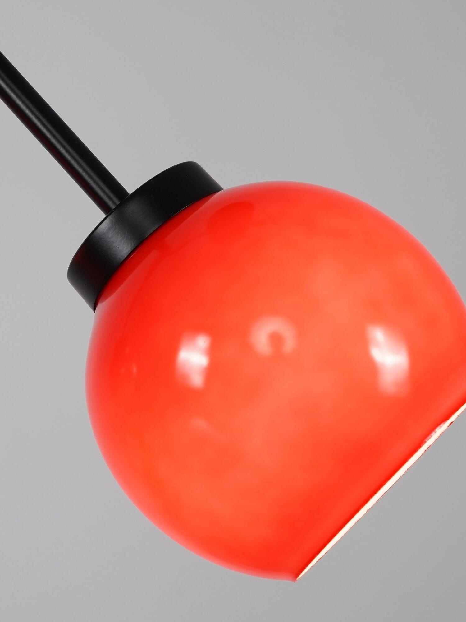 Close view of lit Red shade and Black neck