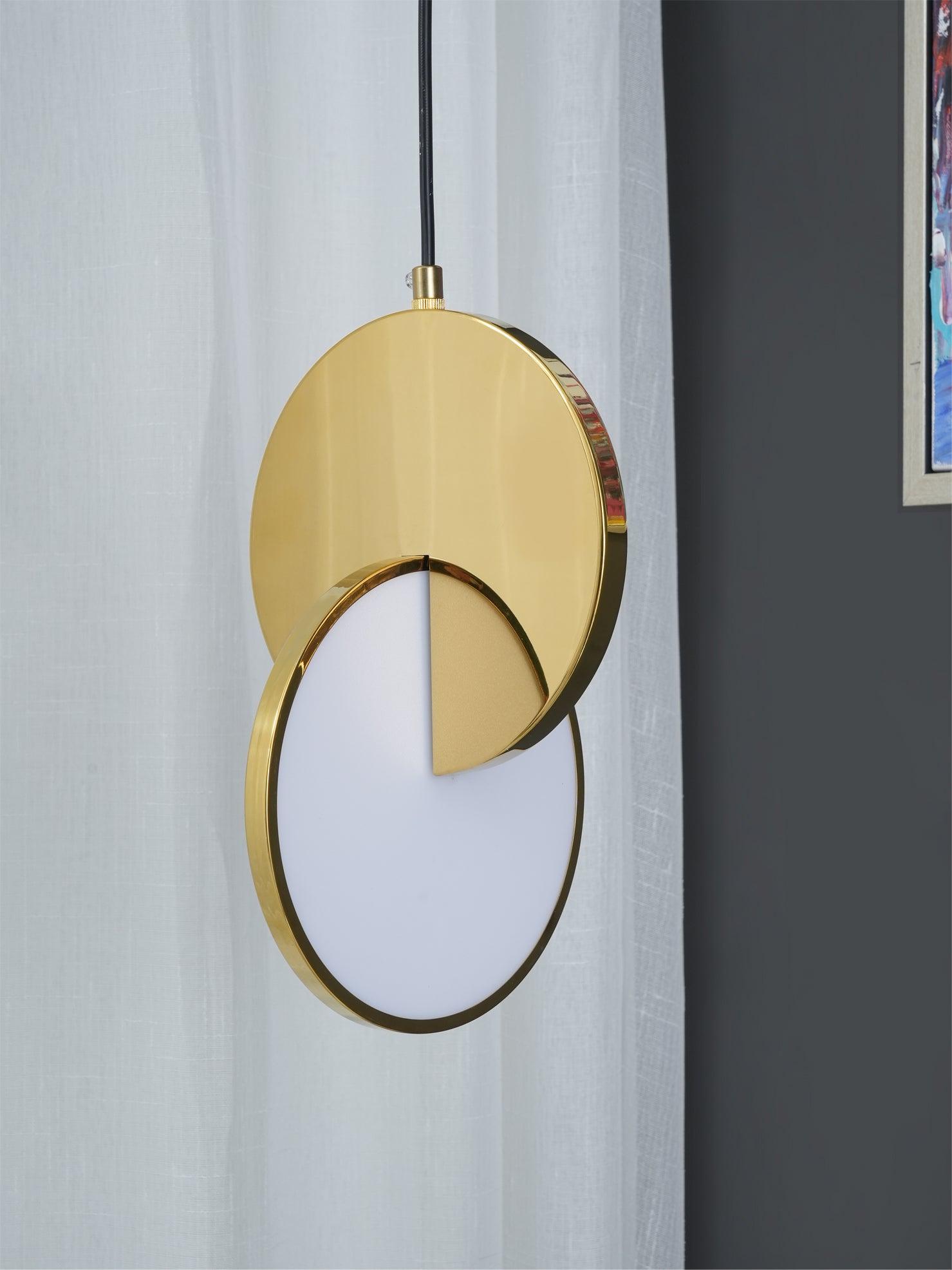 Close view of gold circular panel, white diffuser, rim and cord connector beside curtains
