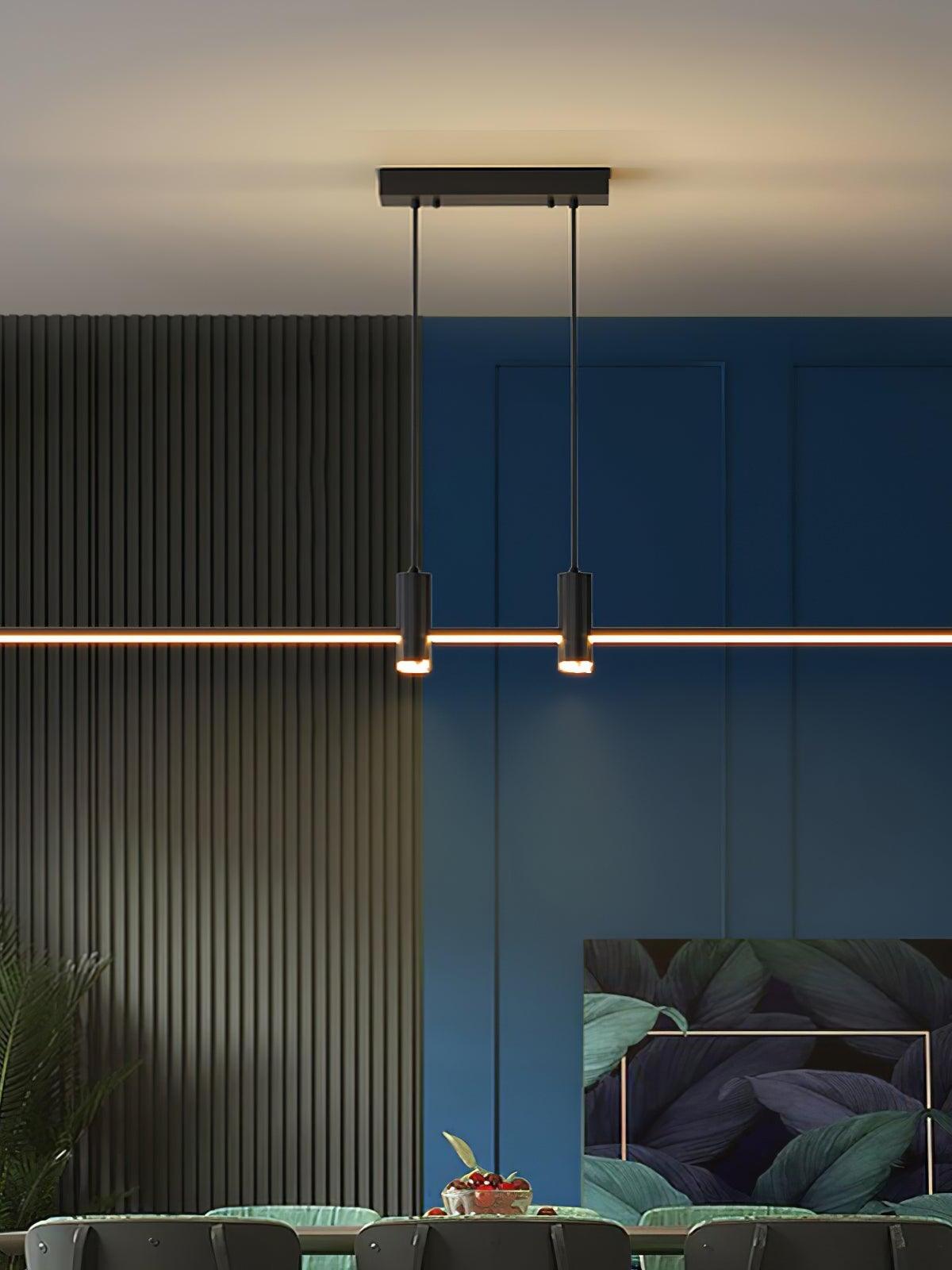 Black single-bar Link pendant with two cylindrical downlights above a dining table