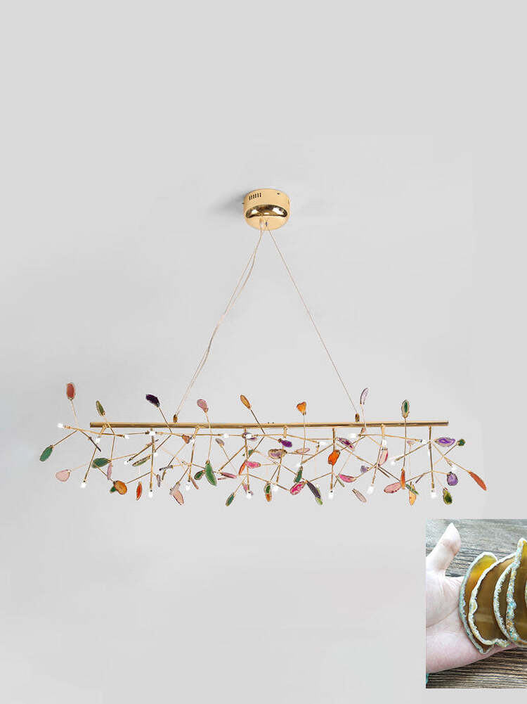 Long linear reference chandelier with yellow stone inset