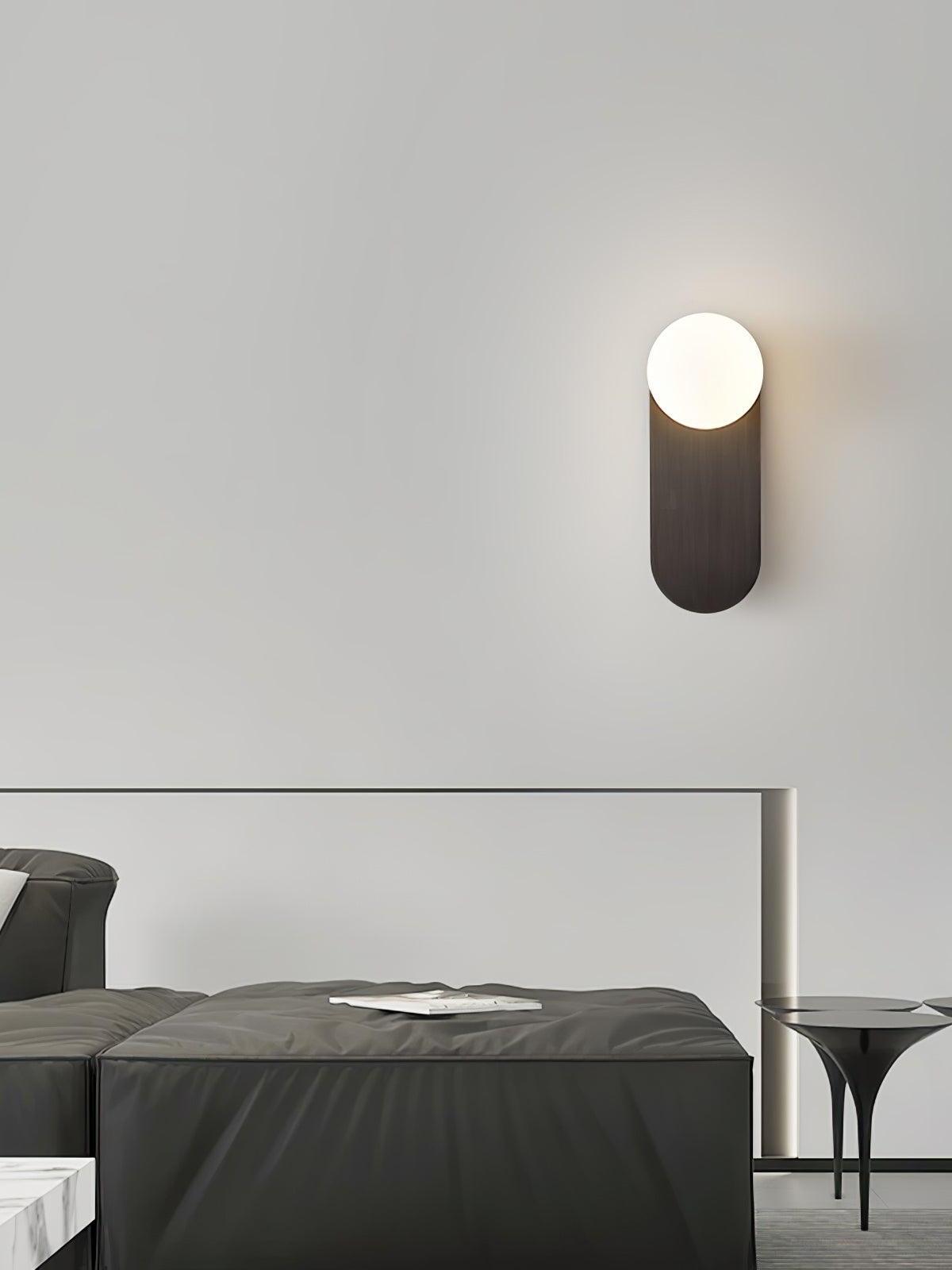 Globe light above an indoor bed