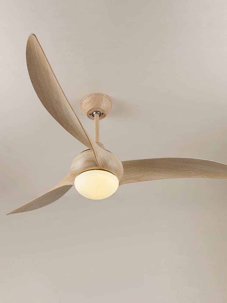 Close upward view of pale woodgrain-looking blades curving around a warm-looking light with matching rod and canopy