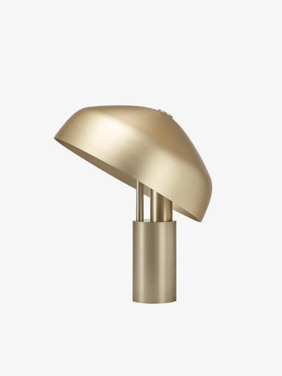 Gold metal dome tilted above cylindrical base
