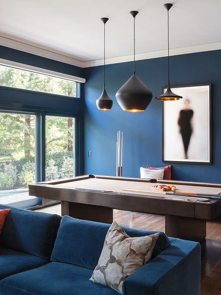 Black shade group in a blue-walled room
