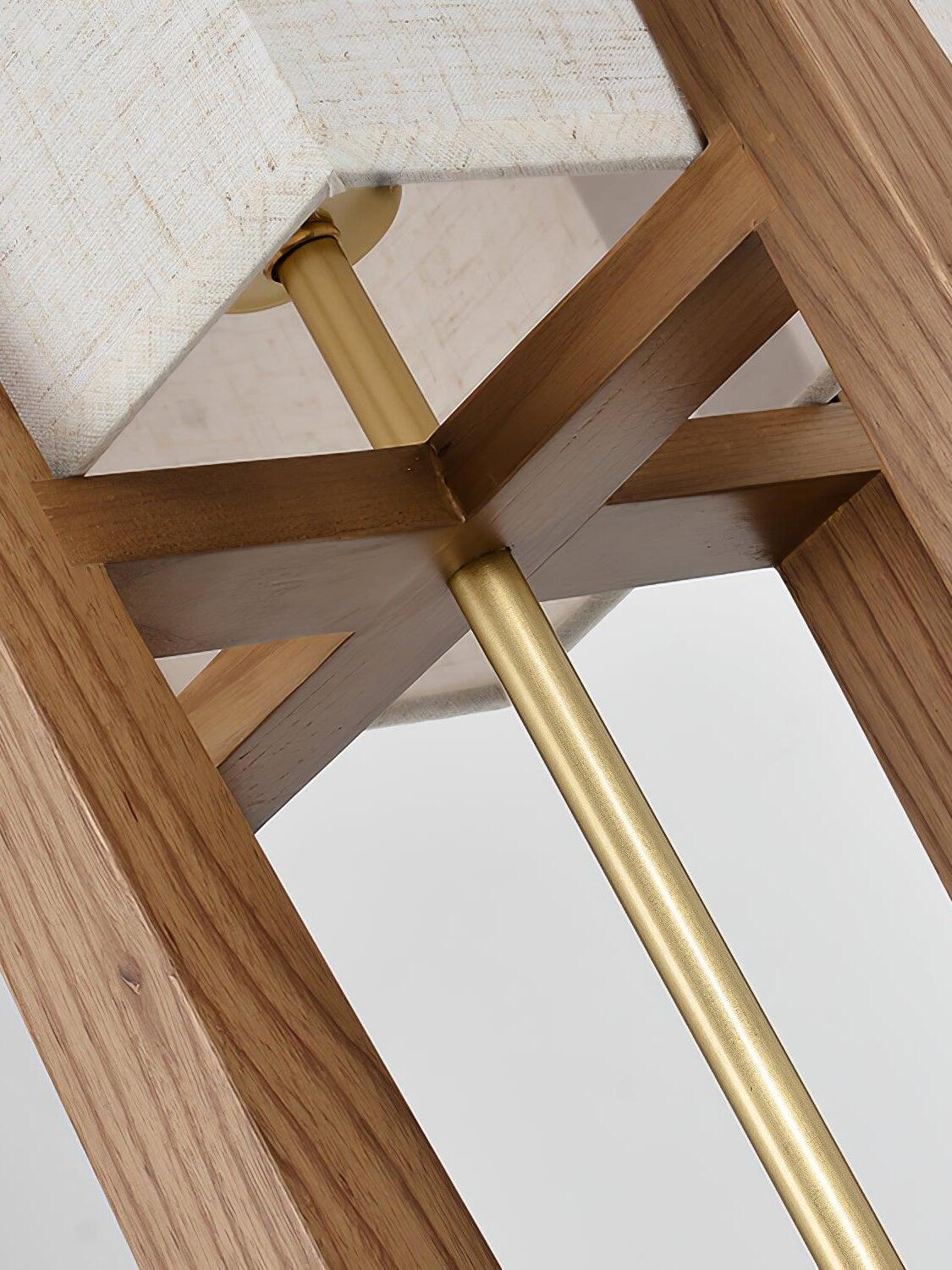 Cross braces and metal stem below fabric shade