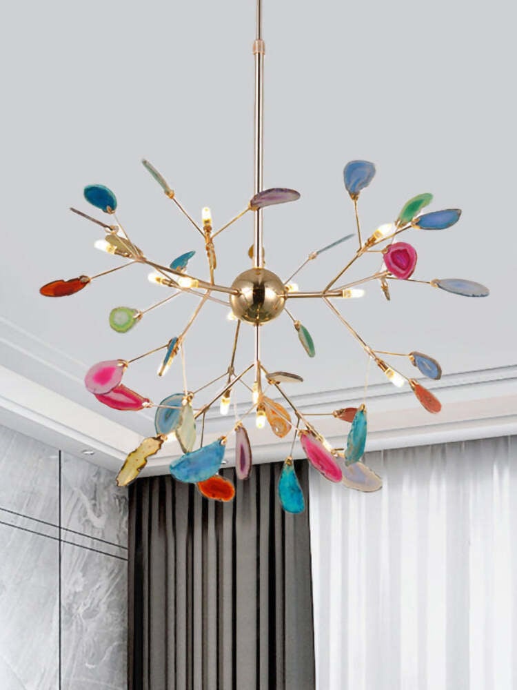 Multicoloured radial chandelier above a bright room