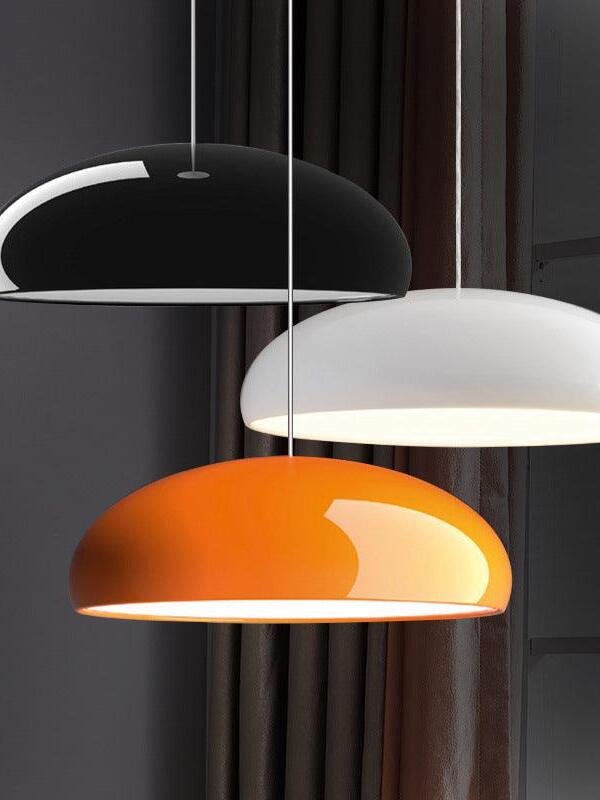 Three glossy domes at different heights