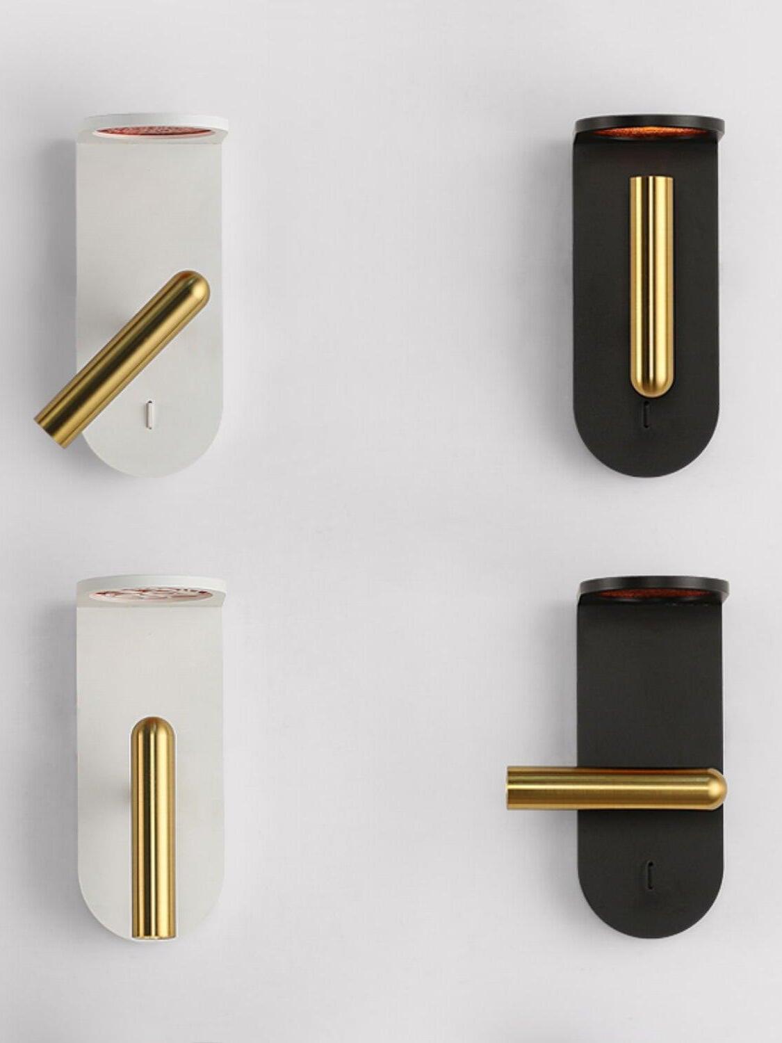 Four views of white and black Nights wall lights showing vertical, angled and horizontal head positions