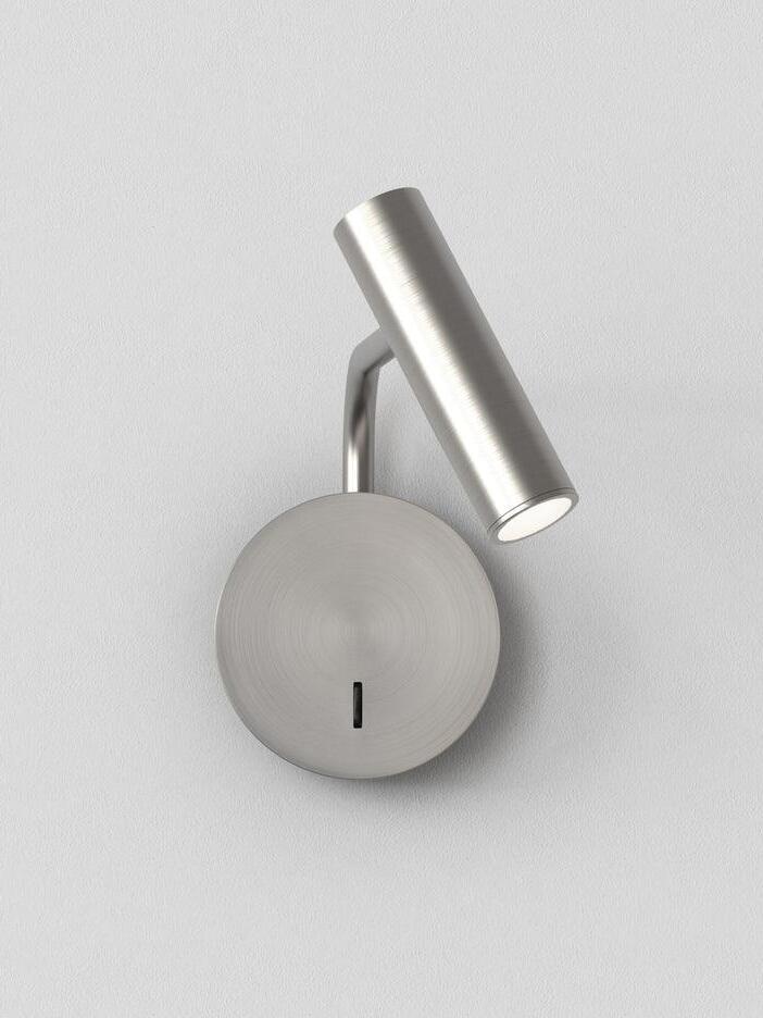 Nickel-coloured reading head above a round backplate